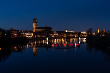 Magdeburg at night with reflections