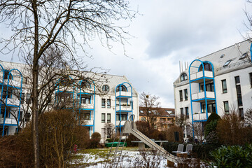 Apartment buildings, condominiums in Germany, with playground in front of the apartments