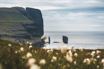 Risin and Kellingin rocks in the sea as seen from Tijornuvik bay on Streymoy on the Faroe Islands, Denmark, Europe