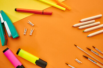Brushes, markers and stapler closeup, stationery