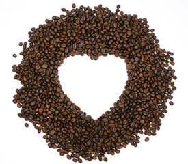 Heart from coffee beans,Roasted coffee beans heart on a white background.