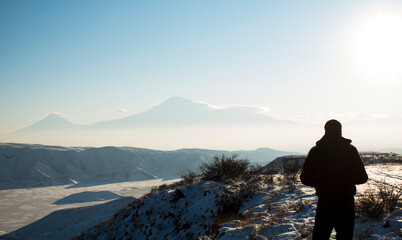 man on the background of Mount Ararat