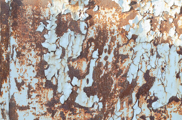 Rusty metal surface. Old peeling paint on an iron surface.