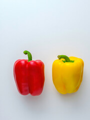 Red and Yellow Bell Pepper on White Background