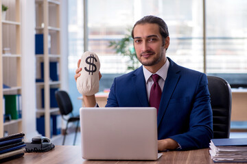 Young businessman employee working in the office
