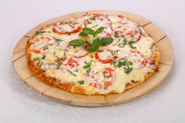 Pizza with tomato and cheese