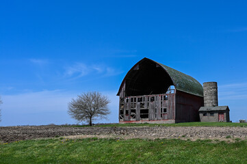 A dilapitated barn in springtime © renee