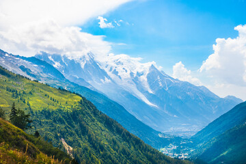 Chamonix valley and the village and city and the Mont Blanc mountain range emerging from the clouds, Col de Balme, France