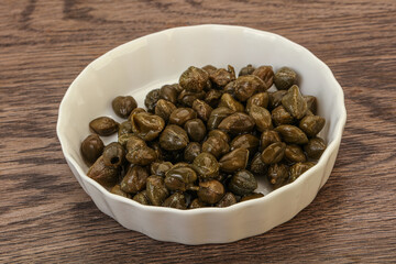 Tasty capers in the bowl