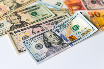 Paper money. Euros and dollars.