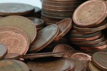 Euro centimeter coins in heaps