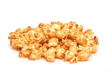 Bunch of fresh popcorn closeup on white. Caramel sweet popcorn. Top view.