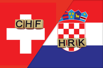 Switzerland and Croatia currencies codes on national flags background