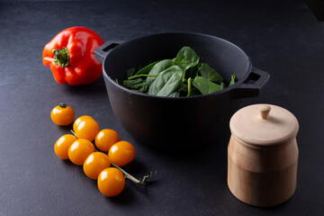 The ingredients for making a vegetarian soup are vegetables and a saucepan.