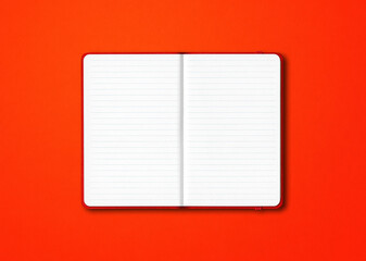 Red open lined notebook isolated on colorful background