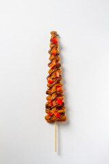 Waffles Stick, glazed with hazelnut chocolate, topping of strawberries. White background
