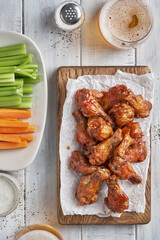 buffalo chicken wings with celery and beer