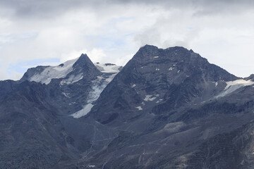 Fototapeta na wymiar View from the Spielboden Walliser Alps Saas-Fee on a mountain against