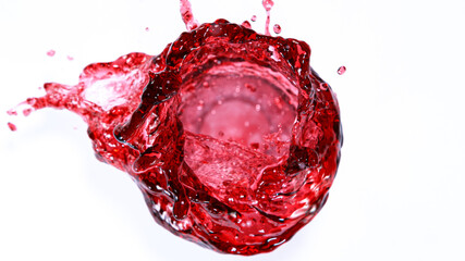 Red wine splash in vortex shape isolated on white background