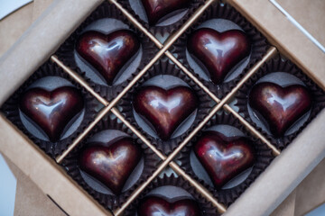 Sweeties in hearts shape on Valentines Day gifts