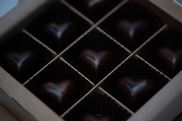 Chocolade sweets on black background. Valentines day concept