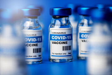 covid-19 vaccine - coronavirus vaccination bottles. injection vials