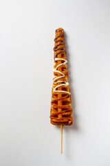 Waffles Stick, White background topping of vanilla and chocolate
