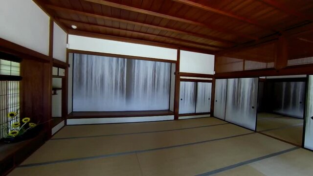 Steadicam shot pans across Japanese room and moves onto veranda (Engawa) with Japanese maple tree.