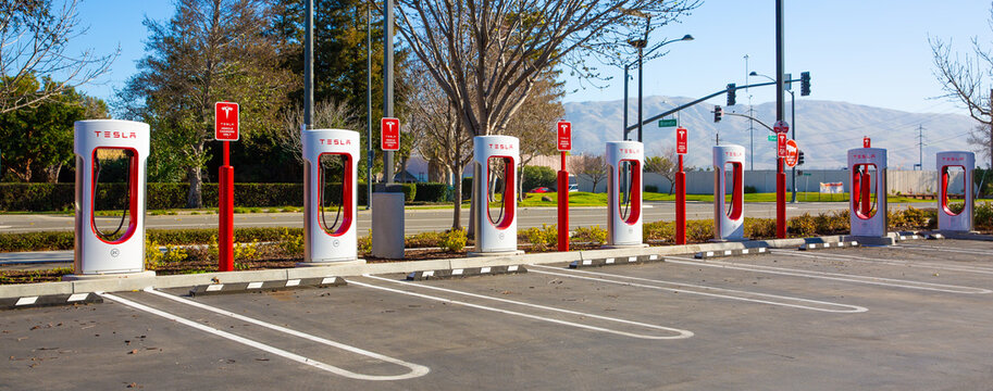 Fremont, CA, USA - January 20, 2021: Tesla Supercharger for electric cars. Tesla is  an American electric vehicle and clean energy company based in Palo Alto, California