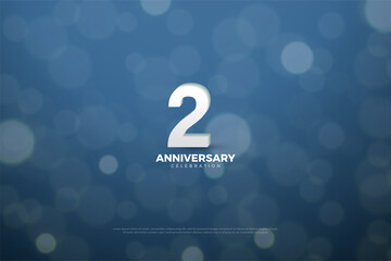 2nd Anniversary with a navy blue background with bokeh effect.