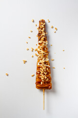 Waffles Stick, White background with vanilla, chocolate and peanuts