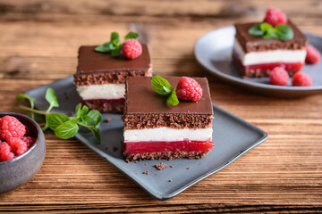 Delicious chocolate raspberry cheesecake, topped with chocolate frosting