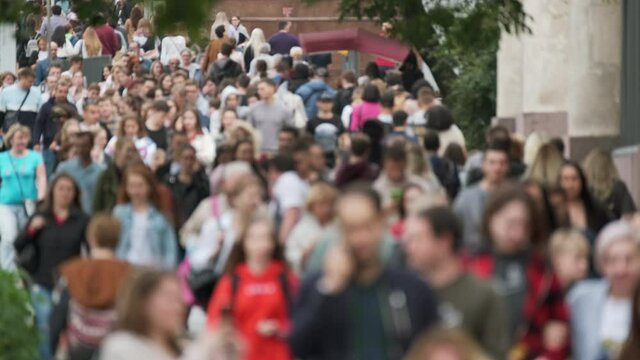Crowd of people on the street. No recognizable faces