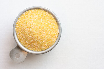 Yellow Corn Meal in a Measuring Cup