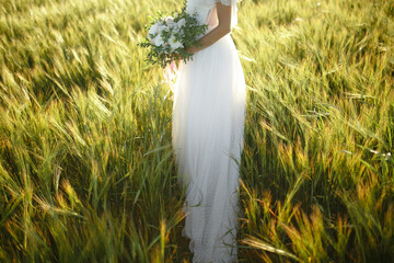 Bouquet in the hands of the bride. Bridal bouquet.