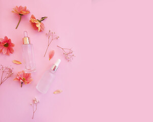 cosmetic cream,  flower on a colored background
