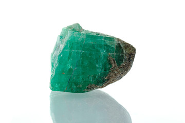macro mineral stone emerald on a white background