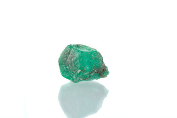 macro mineral stone emerald on a white background