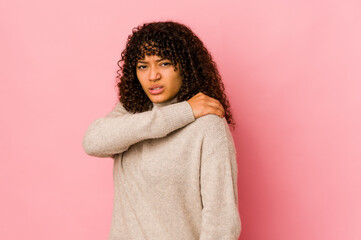 Young african american afro woman isolated having a shoulder pain.