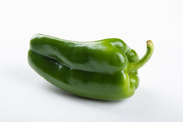 Ripe green pepper isolated with white background