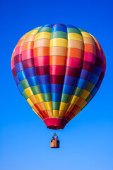 Naklejka premium Multicolor Hot Air Balloon in Flight