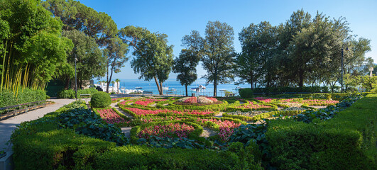 spa garden Opatija, Croatia with bamboo, buxus and begonia flower beds