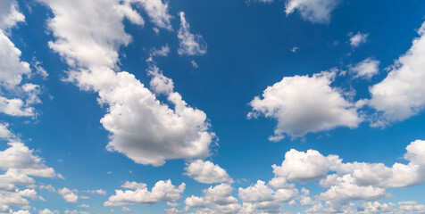 Obraz na płótnie Canvas Blue sky with white fluffy clouds.