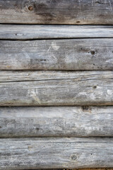 close-up of a gray log wall