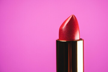 Lipstick on pink background. Showcase or advertisement for beauty brand, Concept of fashion, cosmetics with copy space