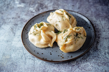 Steamed manta rays with meat sprinkled with dill in a plate