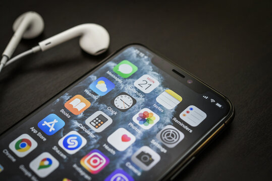 Unpacked new Apple  iPhone 11 Pro Space Gray on black background