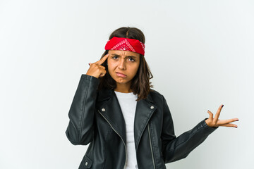 Young latin rocker woman isolated on white background