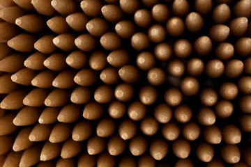 Top view of wooden birch toothpicks macro photo