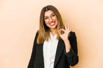 Young indian business woman isolated cheerful and confident showing ok gesture.